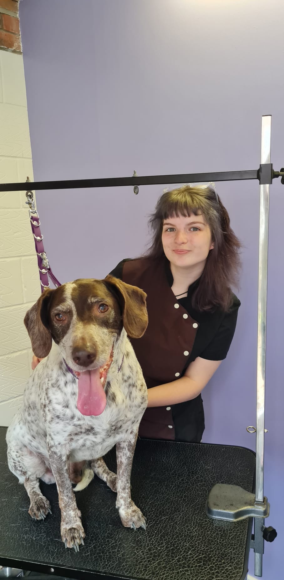 Ali with a happy pup at Waggy Bums